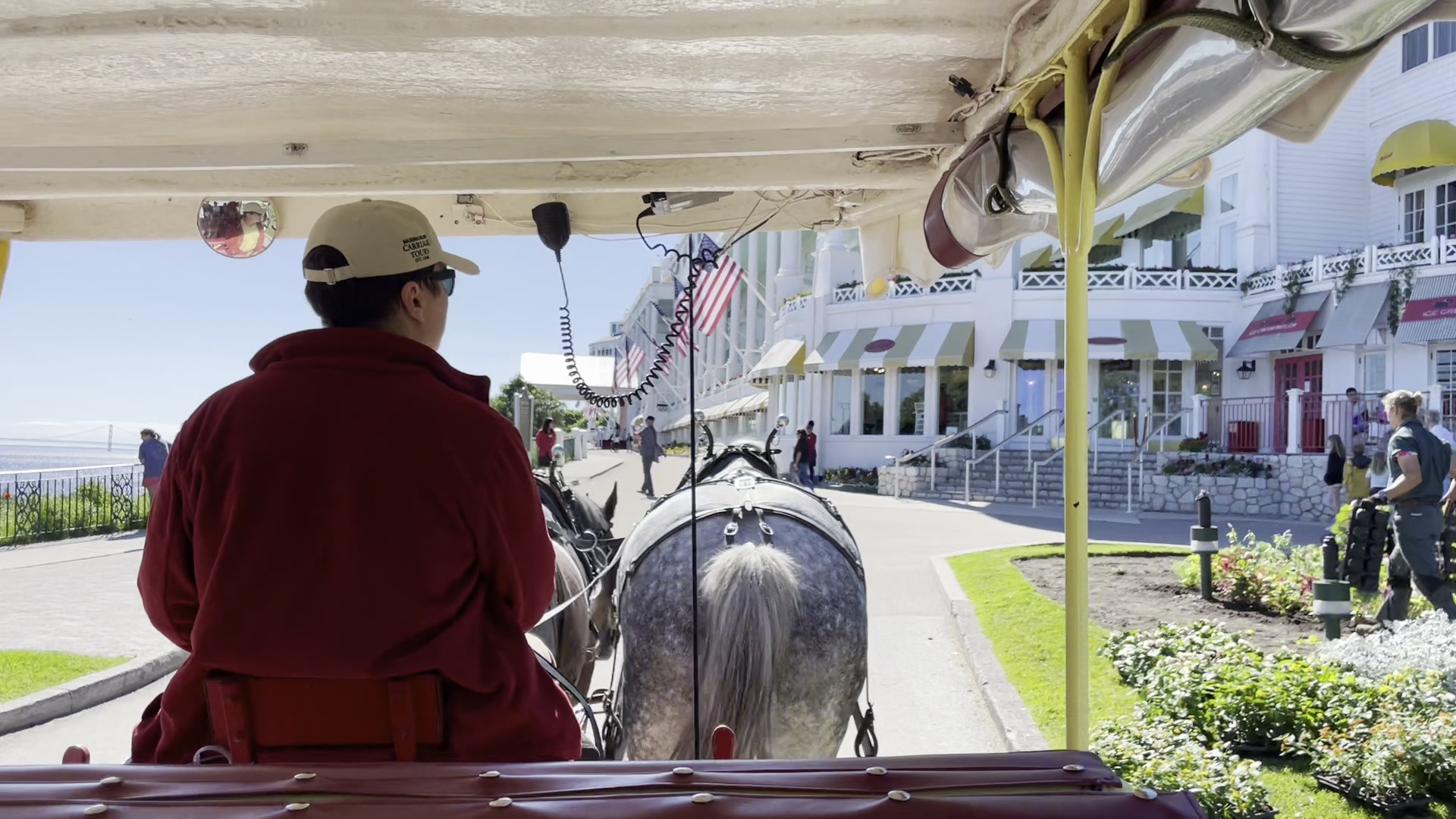 View from inside horse-drawn carriage on Mackinac Island's Main Street
